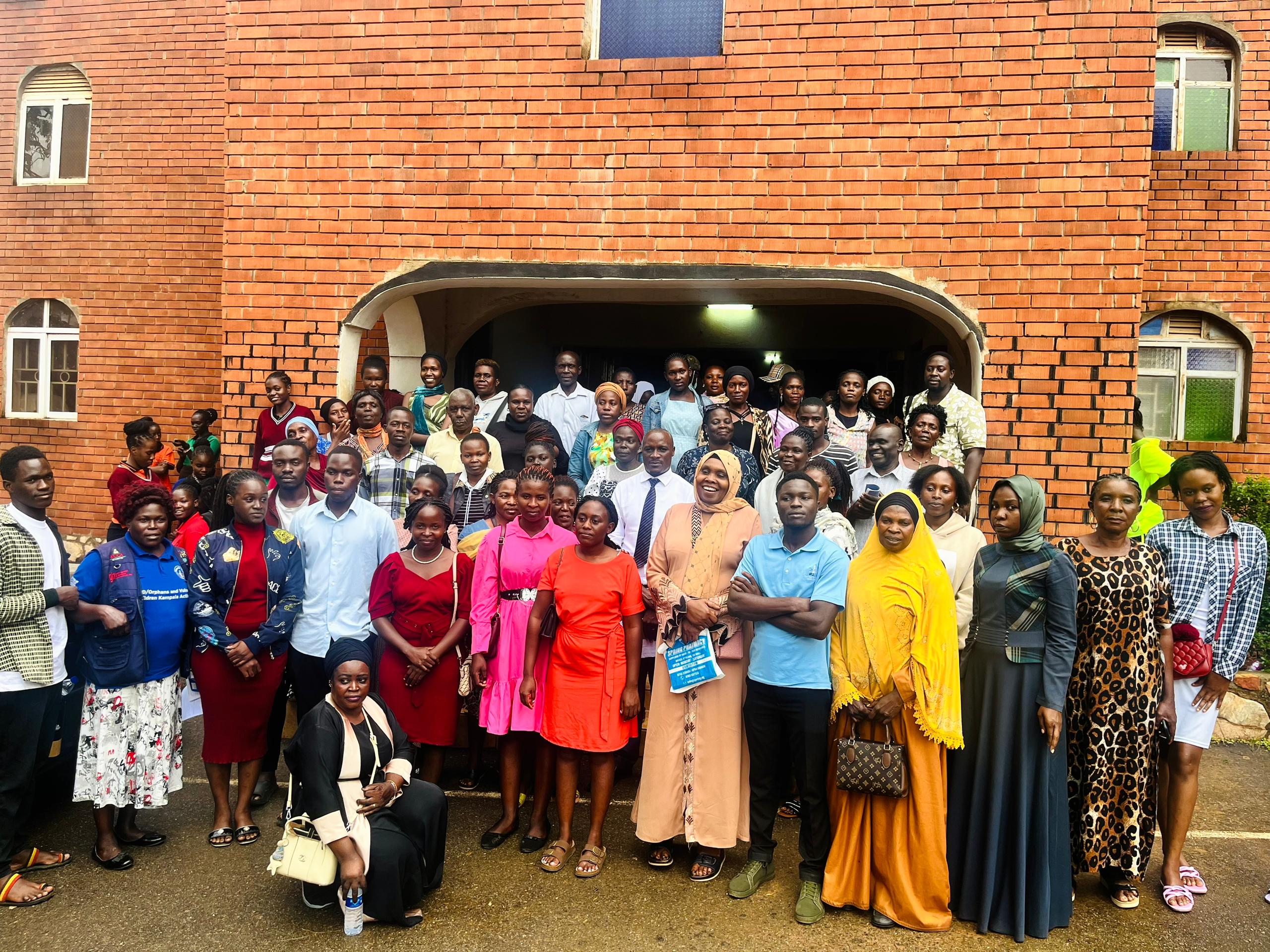 JM-CCER community members gathered together in Kampala